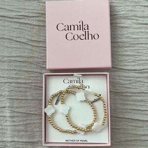Camila Coelho gold mother of pearl bracelets